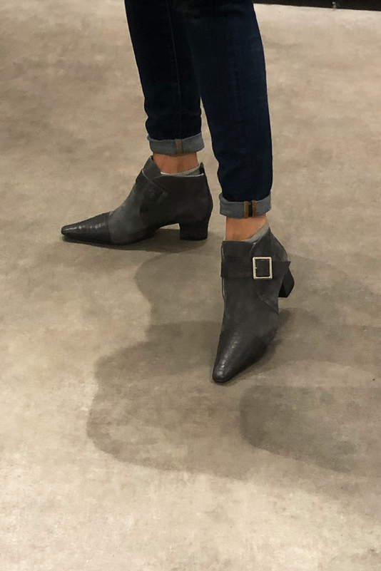 Dark grey women's ankle boots with buckles at the front. Tapered toe. Low kitten heels. Worn view - Florence KOOIJMAN